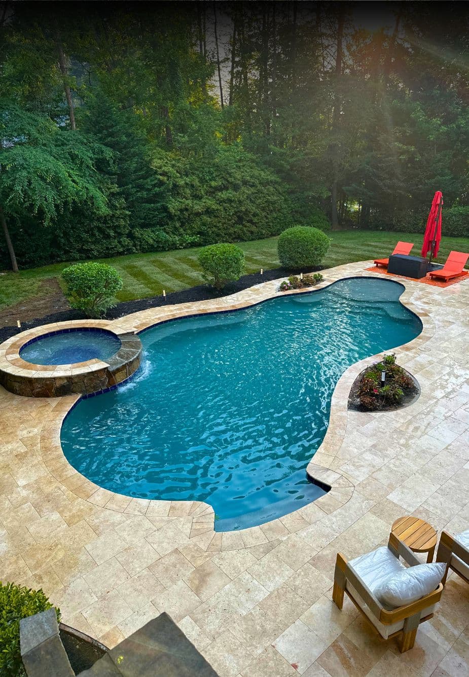 Clean in-ground pool and spa after routine pool maintenance service